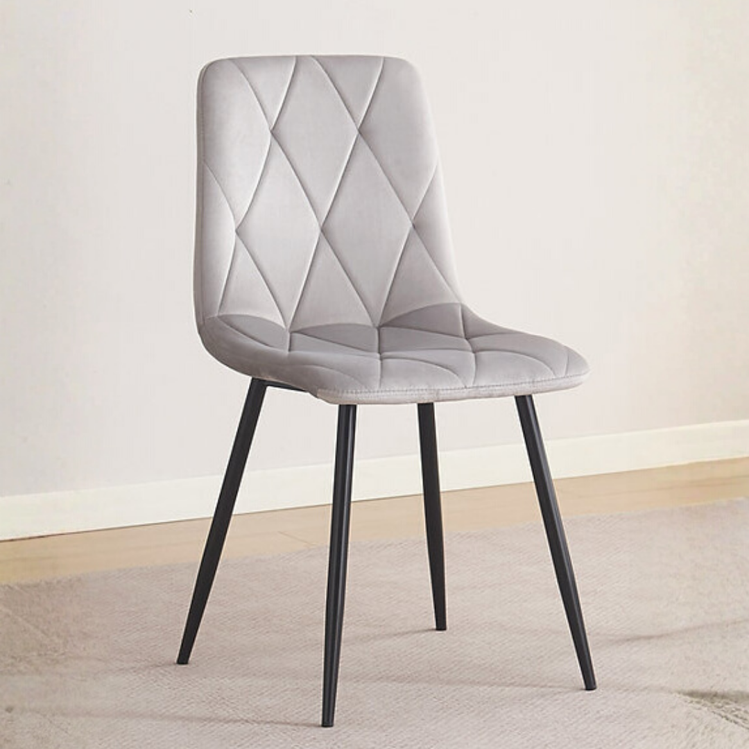 Ensemble 4 chaises salle à manger Diamella velours gris pâle capitonné pieds acier noir Montréal